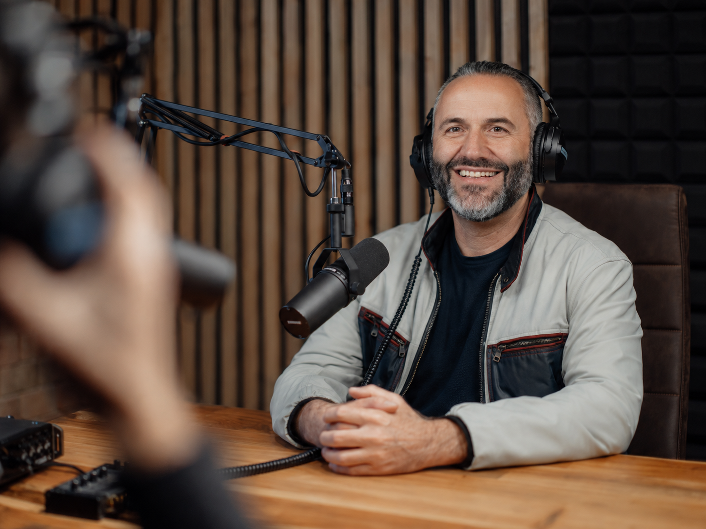 Matthias recording a podcast