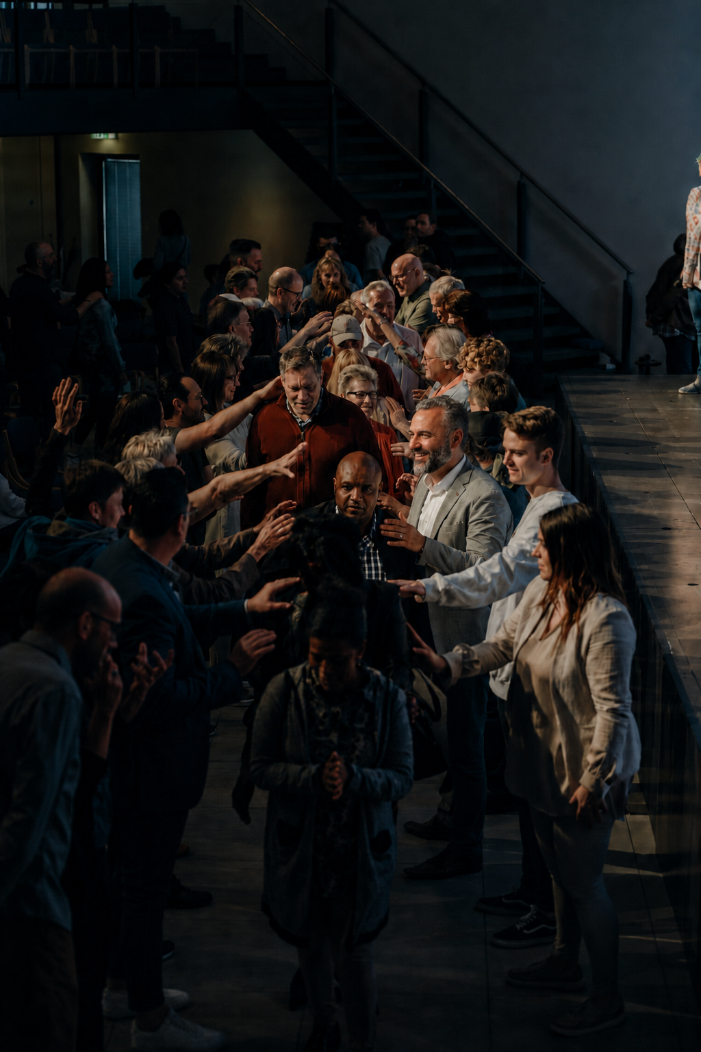 Matthias praying with the congregation