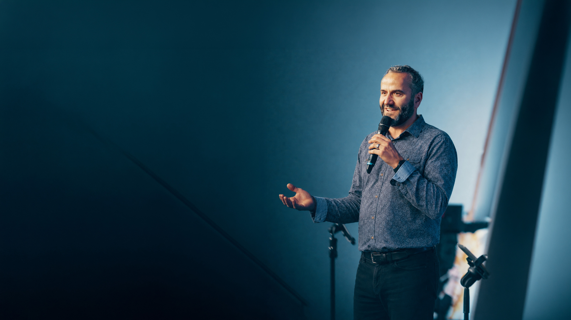Matthias Truttmann preaching on stage